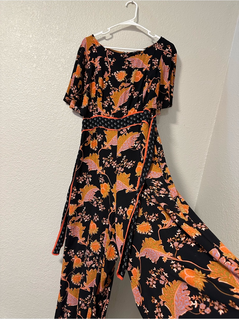 Maeve by Anthropologie Black Floral Wrap jumpsuit with Pink and Orange Print. 12